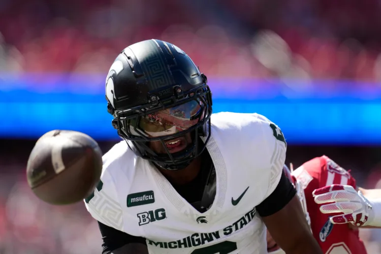 Colton Joseph accounts for 4 touchdowns and Wisconsin routs Michigan State 31-3